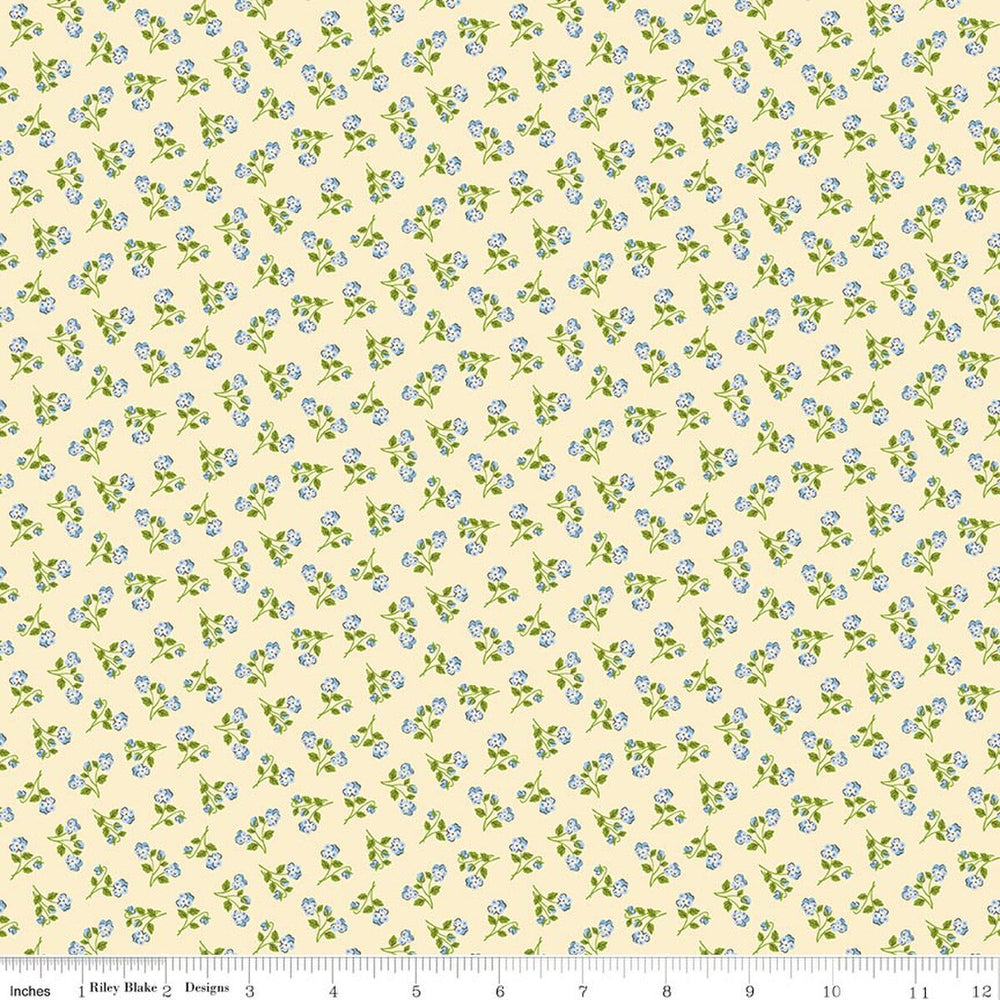 Floral pattern fabric with small blue flowers on a beige background