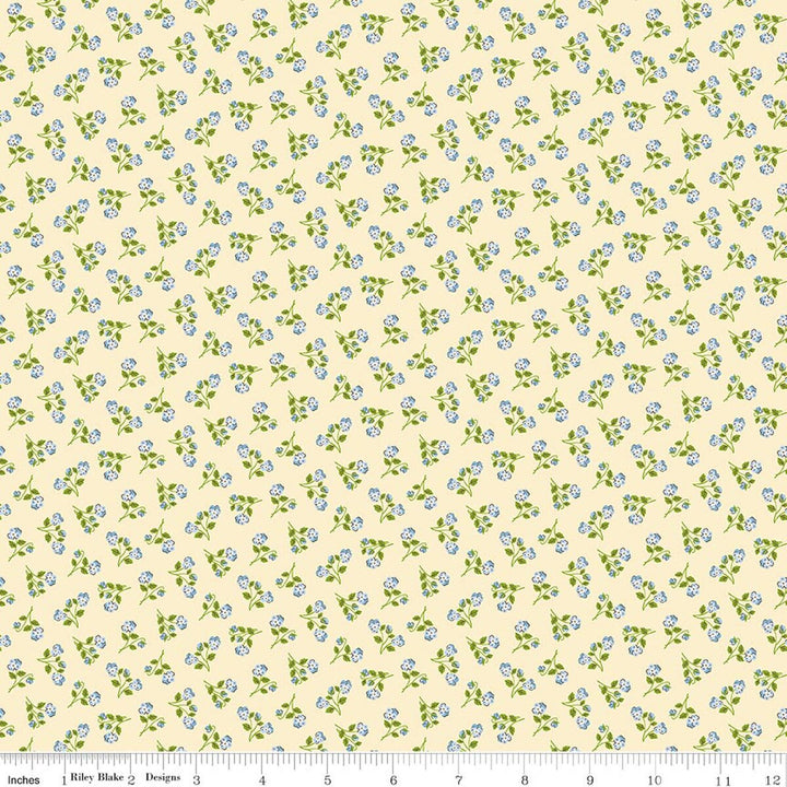 Floral pattern fabric with small blue flowers on a beige background