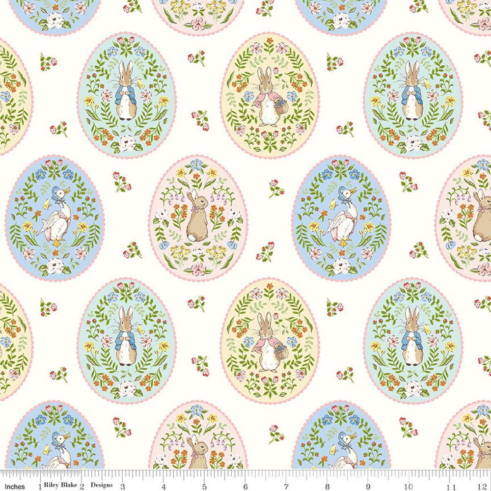Patterned fabric with Easter eggs and bunnies on a white background