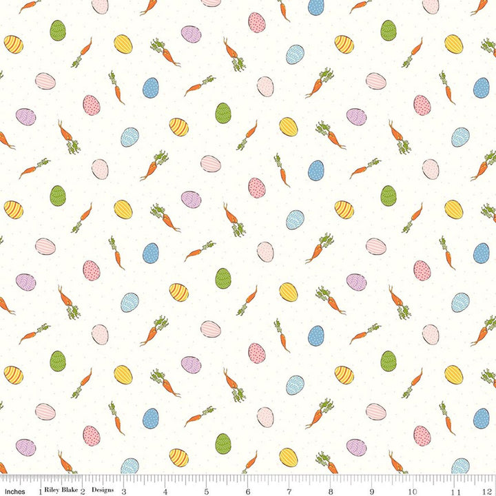 Pattern of Easter eggs, carrots, and flowers on a white background