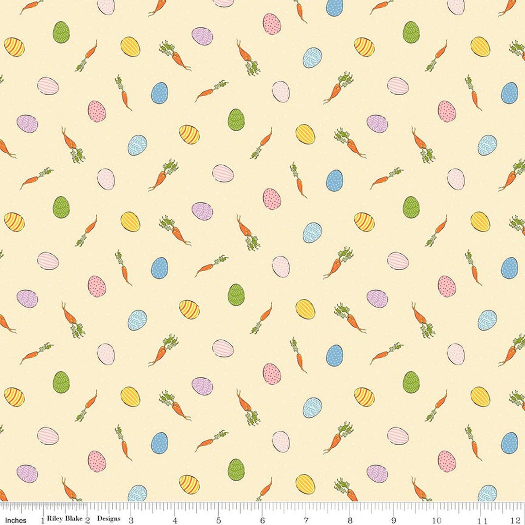 Pattern of Easter eggs, carrots, and tulips on a beige background