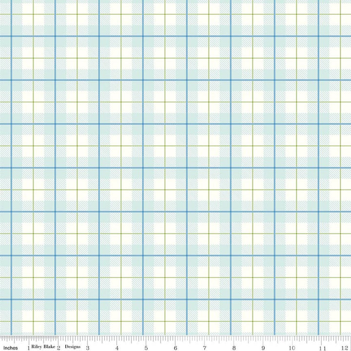 Grid pattern fabric with blue and green lines on a white background