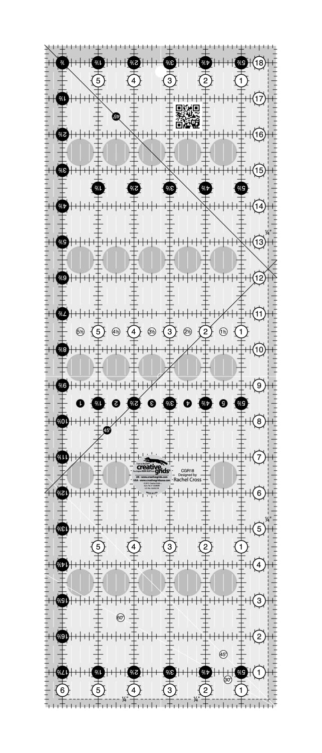 Quilting ruler with measurement markings on a white background