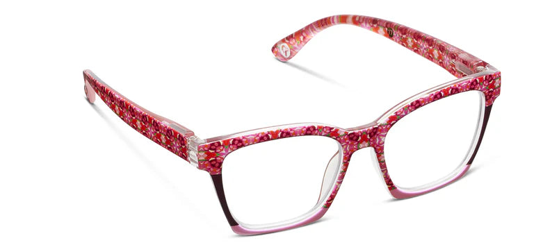 Red floral-patterned eyeglass frames on a white background