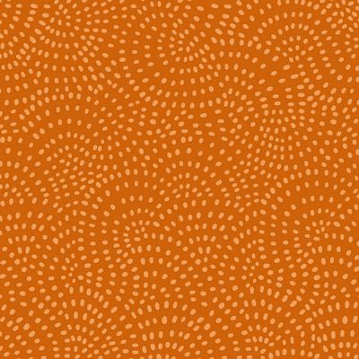 fabric with an orange background and lighter orange dots