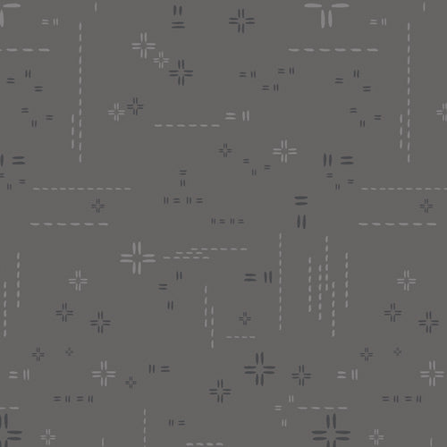 Grey background with cross designs and stitched marks
