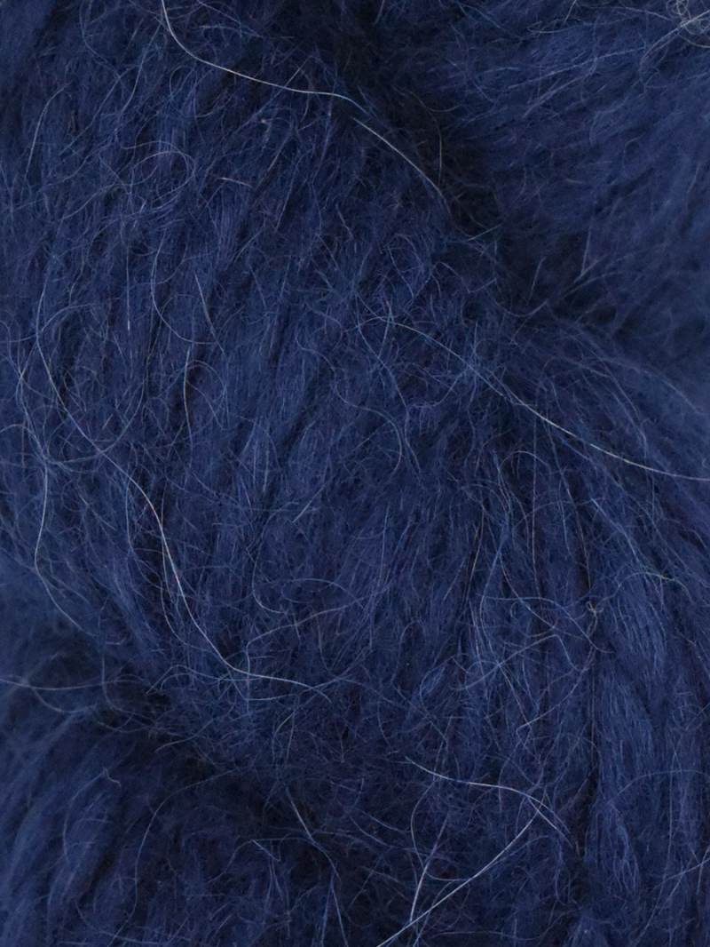 Close-up of dark blue yarn with a fluffy texture