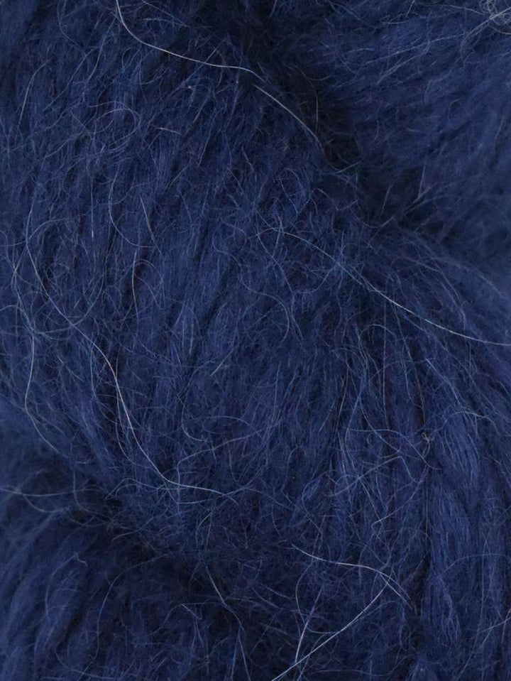 Close-up of dark blue yarn with a fluffy texture
