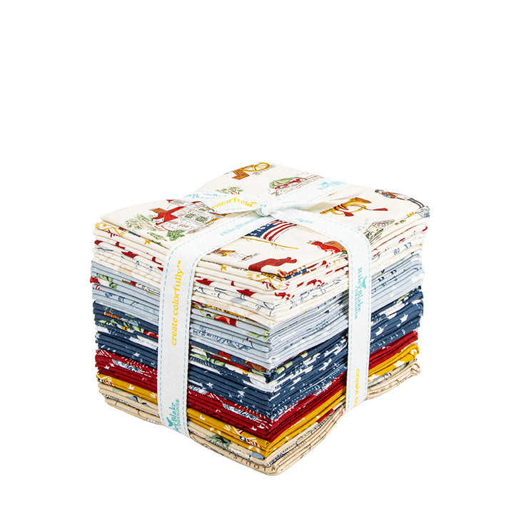 Stack of colorful fabric bundles tied together on a white background