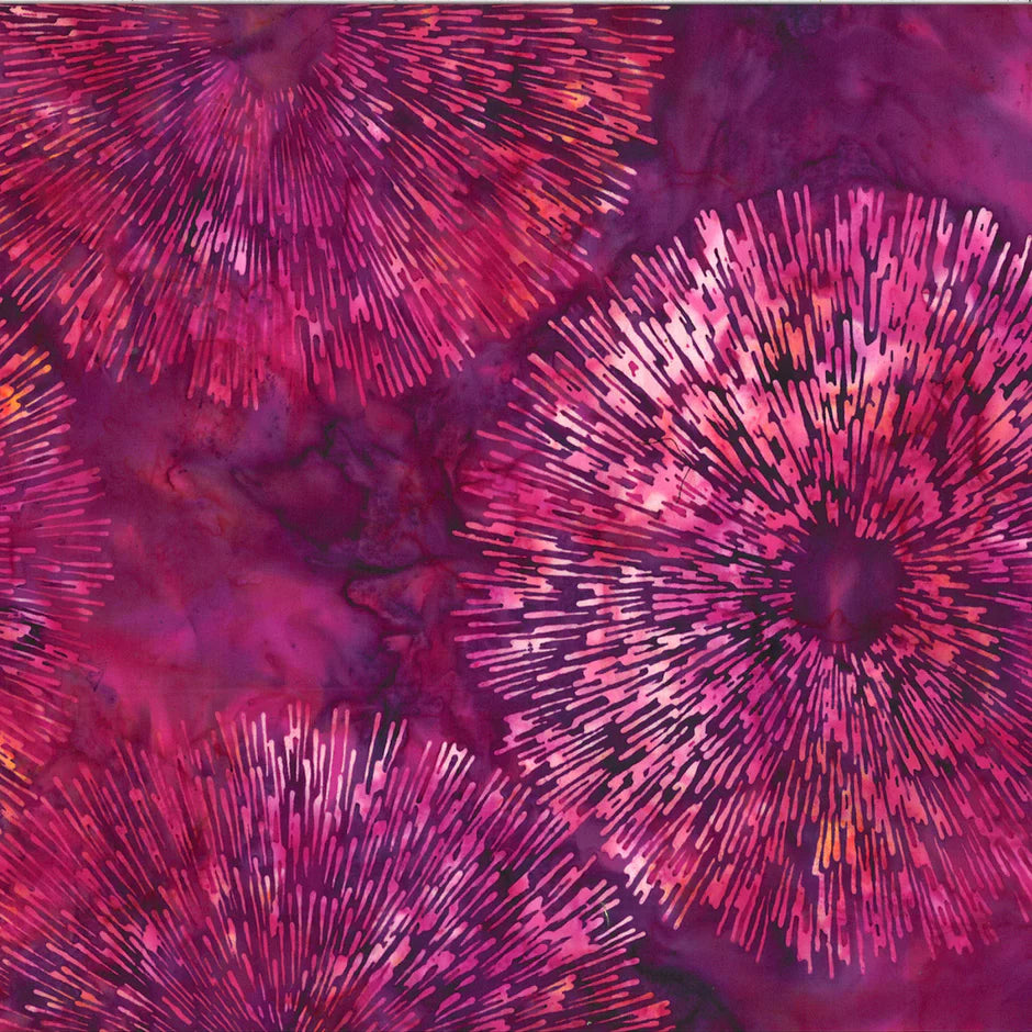 Abstract pattern of pink and purple concentric circles