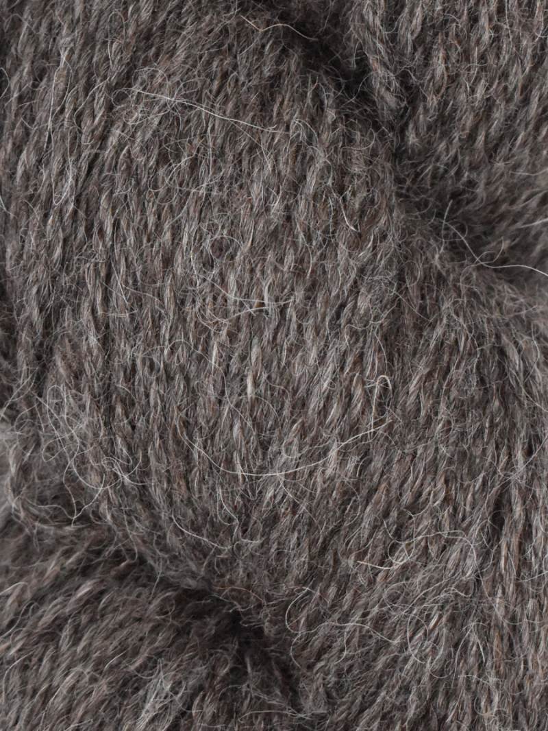 Close-up of a ball of dark brown yarn