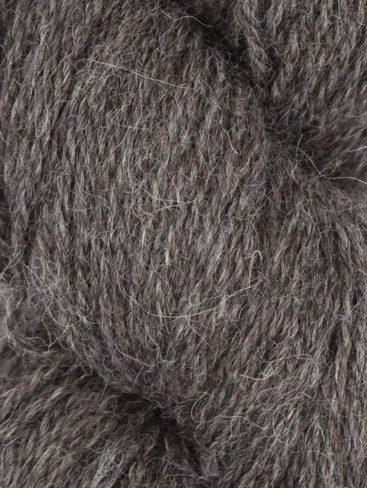 Close-up of a ball of dark brown yarn