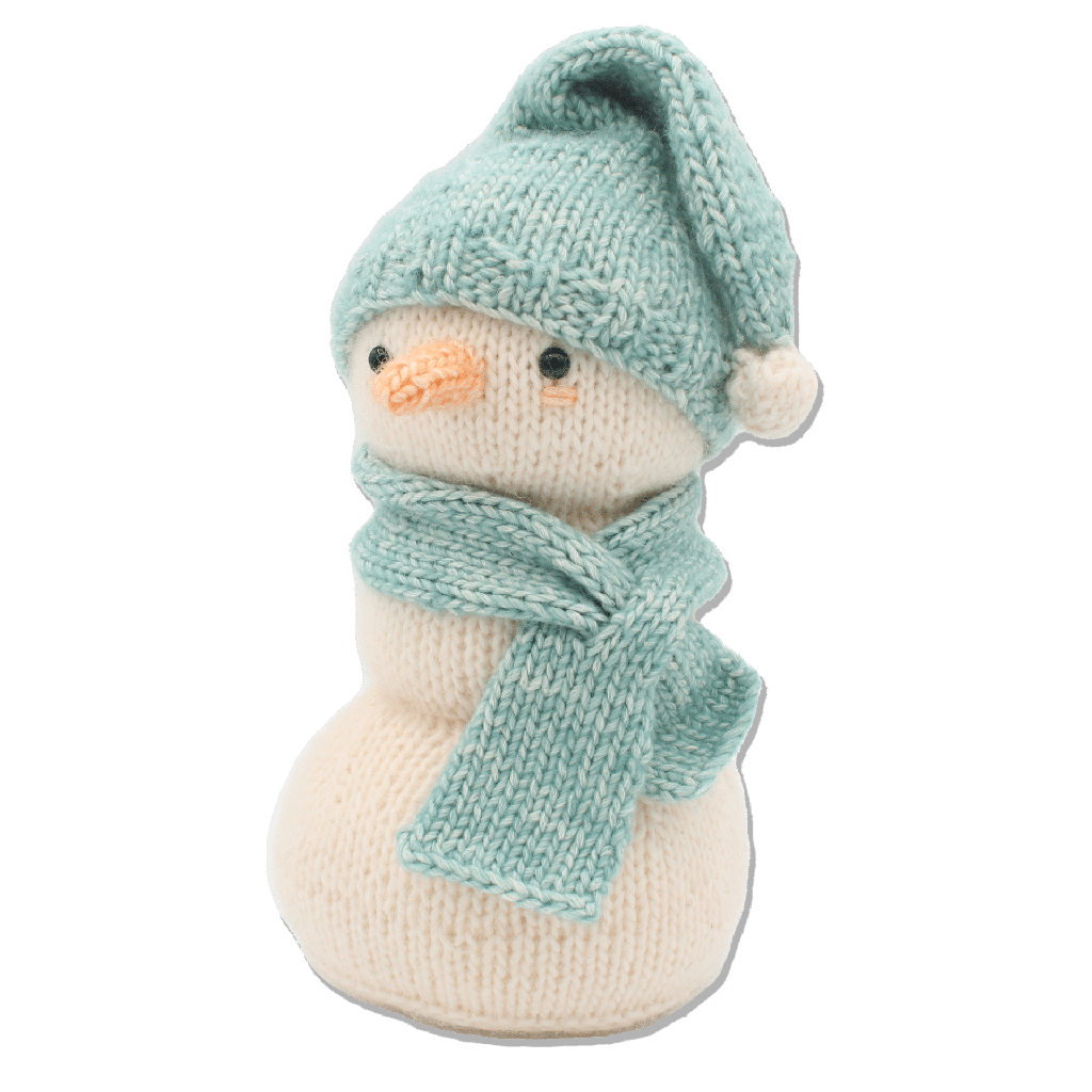 Knitted snowman toy with a blue hat and scarf on a transparent background