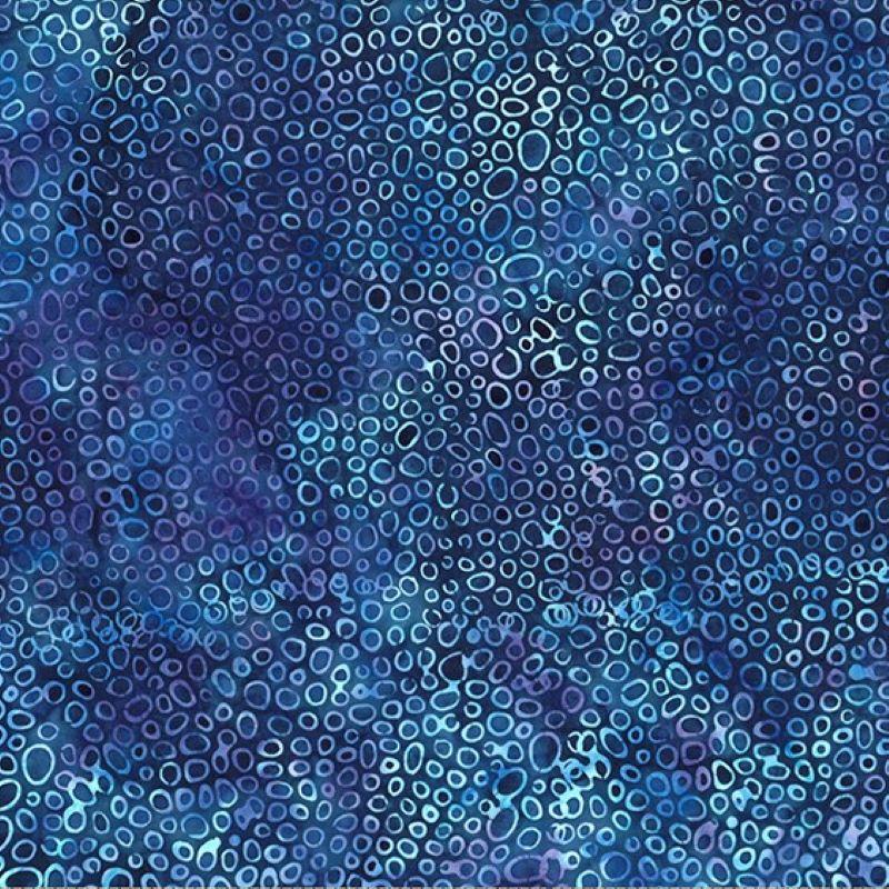 Blue patterned fabric with circular bubble shapes