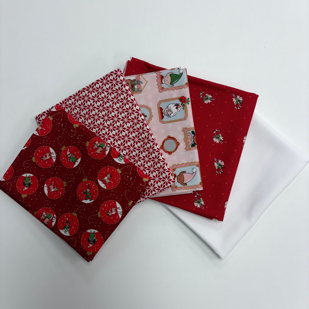 Four fabric swatches with Christmas patterns on a white background