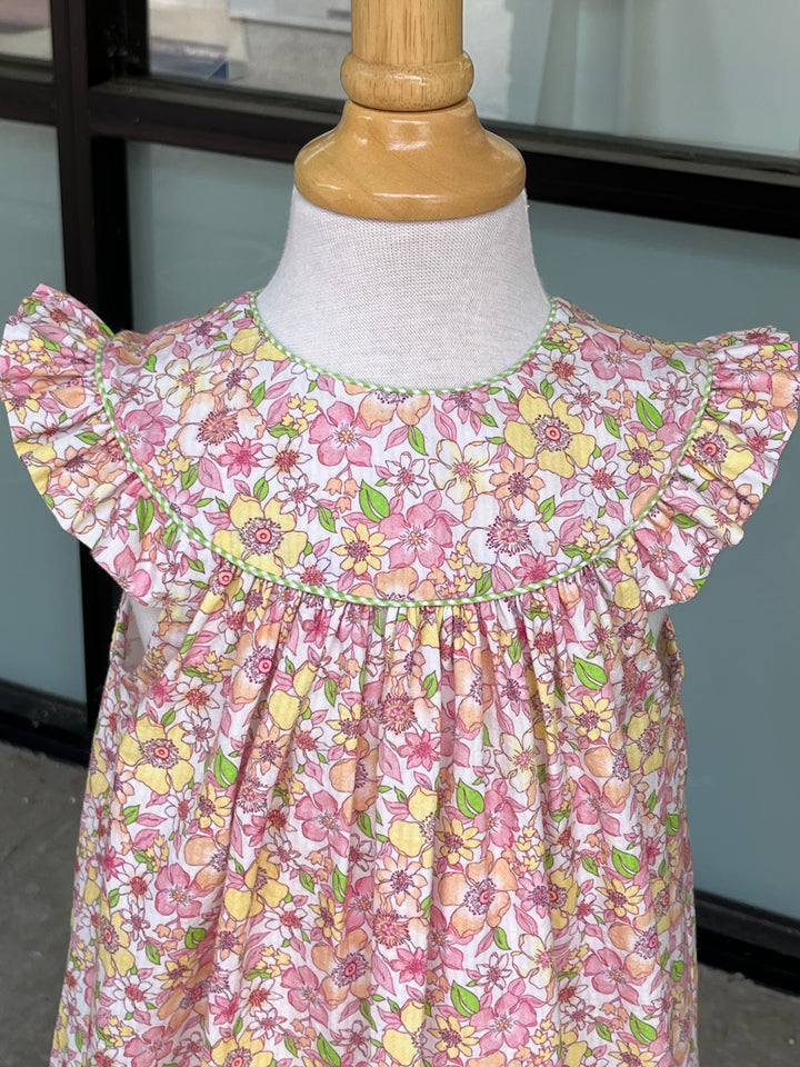 peachy pink and yellow floral dress with lime gingham piping on the yoke