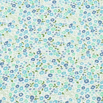 floral print in aqua blue and green on a cream background
