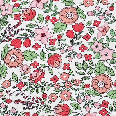 floral print in peachy pinks and sage greens
