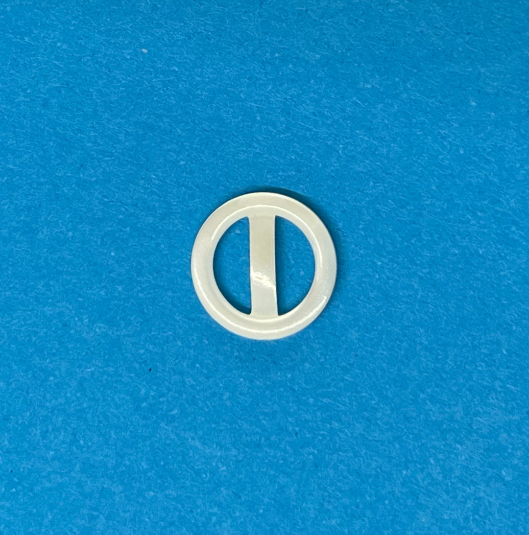 pearl buckle on a blue background