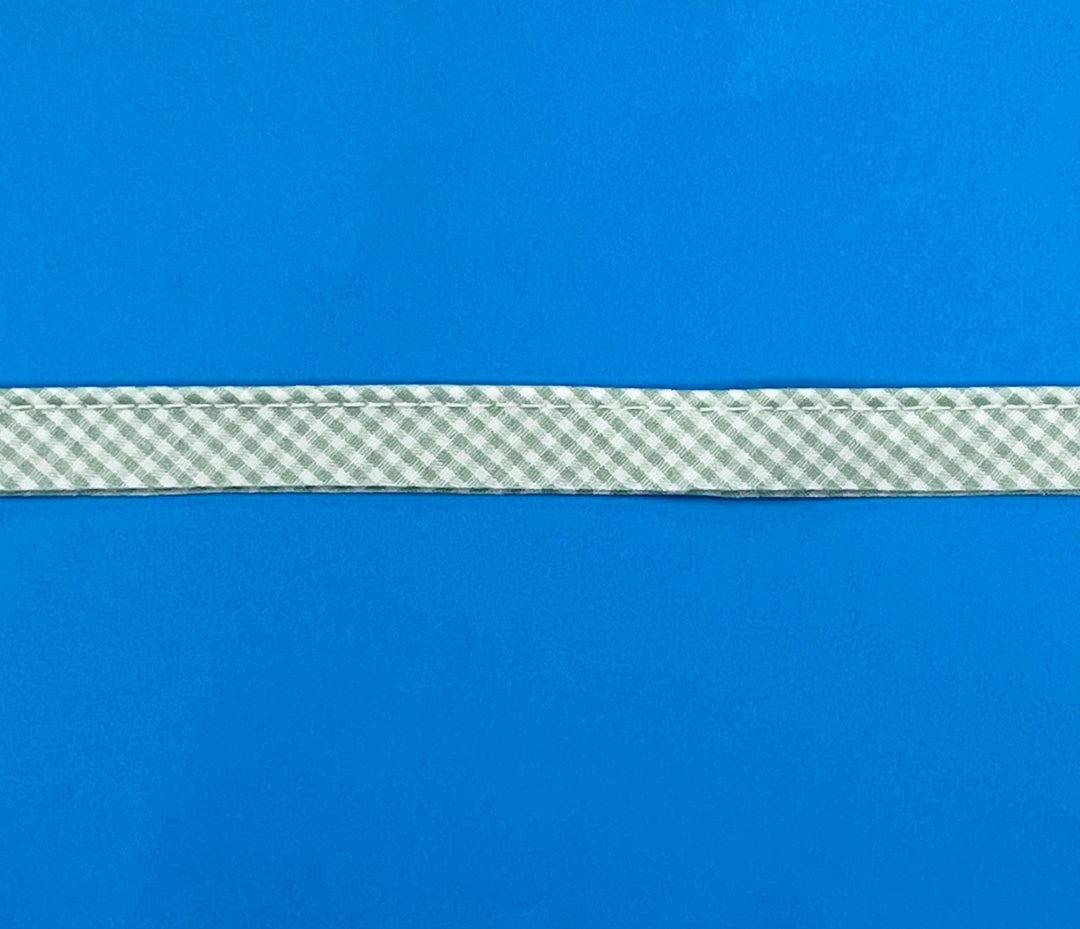 Checkered ribbon on a blue background