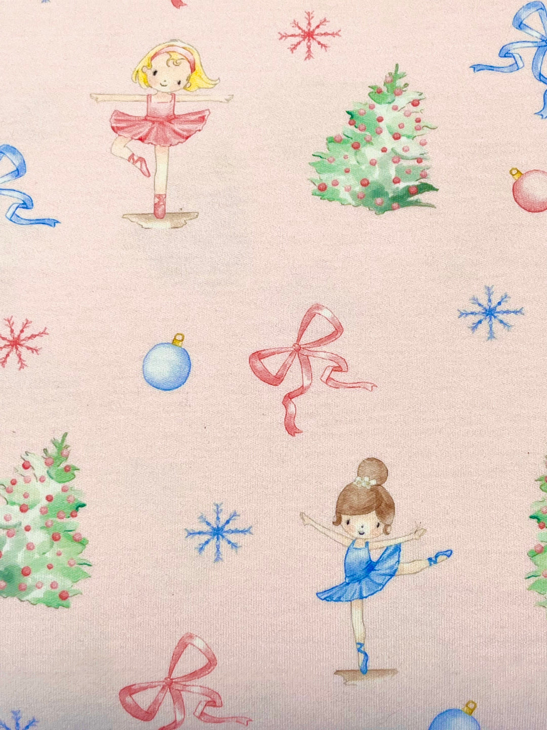 Pattern with ballerinas, Christmas trees, and ornaments on a light background