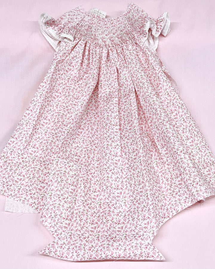 Floral dress on a light pink background