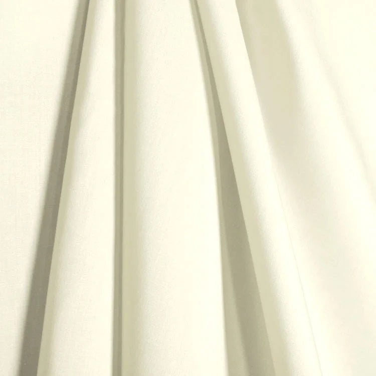 A draped piece of off-white batiste fabric.