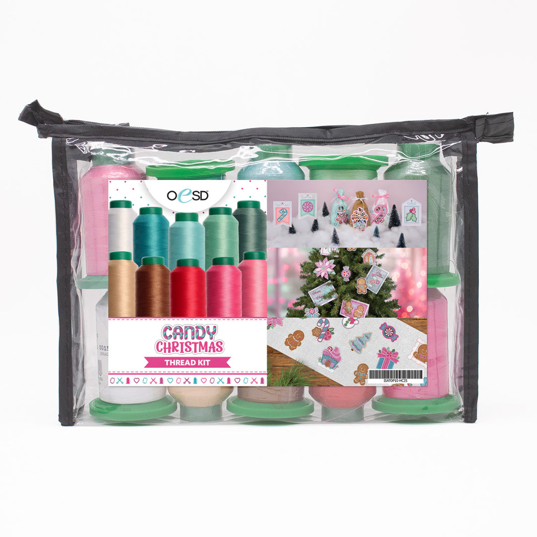 Thread kit with colorful spools in a clear bag, featuring a Christmas theme.
