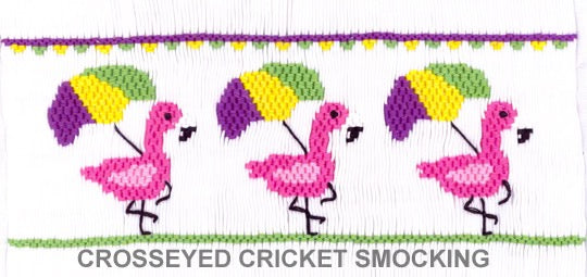 Smocking plate with three flamingos with Mardi Gras colored umbrellas. 8 rows of smocking on a yoke.