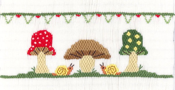 Smocking plate with 3 different mushrooms and snails.