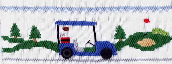 A golf cart among a putting green and golf course. 7 1/2 rows or 154 pleats on a yoke.