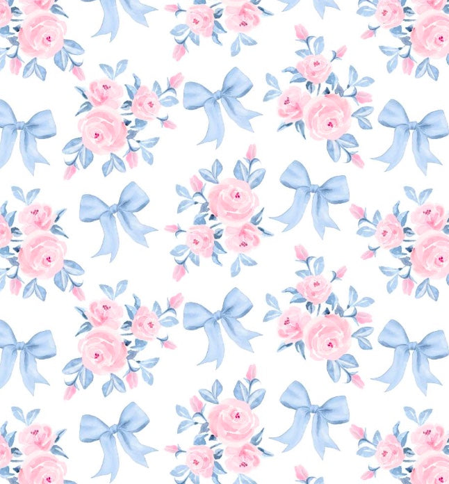 Pattern of pink flowers and blue bows on a white background