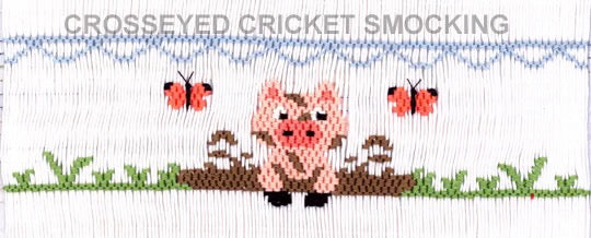 Smocking plate with a pig in mud with some butterflies. 6 1/2 rows on a yoke.