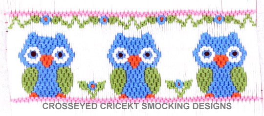 Three blue owls with green wings and red beaks on a pink background with floral elements, featuring 'Crosseye Crickett Smocking Designs'.