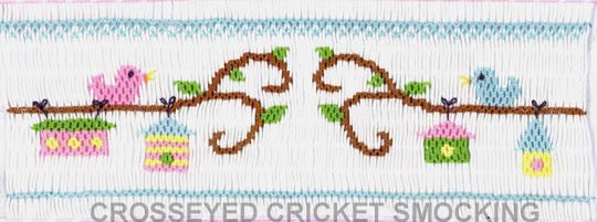 Smocking plate with birds sitting on a tree branch above some bird houses, designed for a yoke. 8 rows of smocking on a yoke.