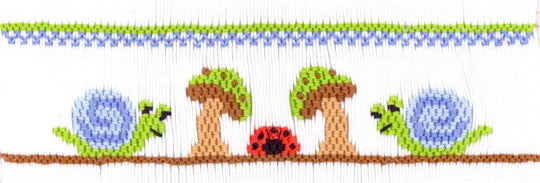 Smocking plate with snails, mushroom and a ladybug. 5 1/2 rows of smocking on a yoke.