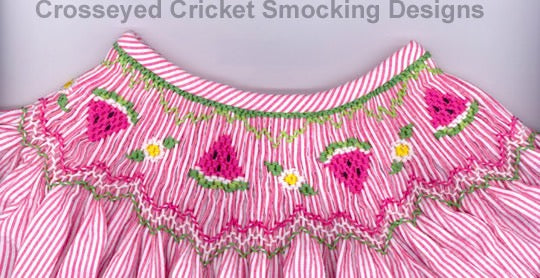 Pink dress with watermelon designs and smocking details on a gray background