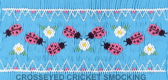 Smocking plate with ladybugs roaming around flowers. 8 1/4 rows of smocking on a yoke.
