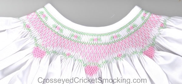 Smocking plate with a geometric heart design with flowers. 7 rows on a bishop. 