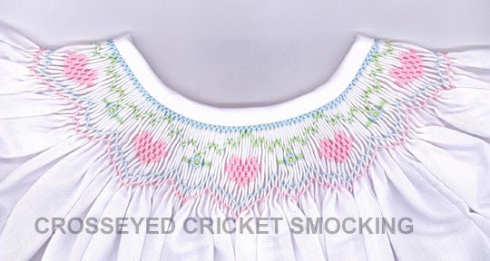 Smocking plate with hearts and a simple flower vine, perfect for Valentine's Day. 4 3/4 rows of smocking on a bishop.