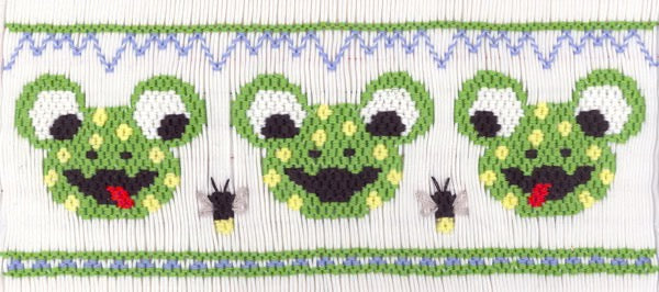 Smocking plate with three frogs eating flies. 8 1/2 rows of smocking on a yoke.