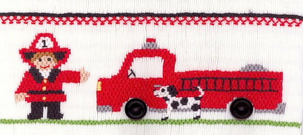 Smocking plate with a fire truck, fireman and Dalmatian dog. 8 rows of smocking on a yoke.