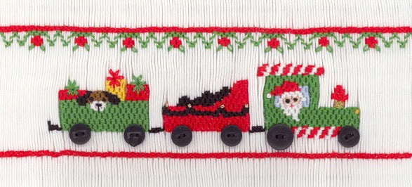 Smocking plate with a Christmas train. 7 rows of smocking on a yoke.