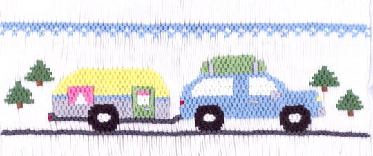 Smocking plate with a car on a road trip pulling a trailer. 6.5 rows of smocking on a yoke.