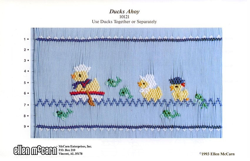 Smocking design of ducks on a blue background with McCarron Enterprises branding.