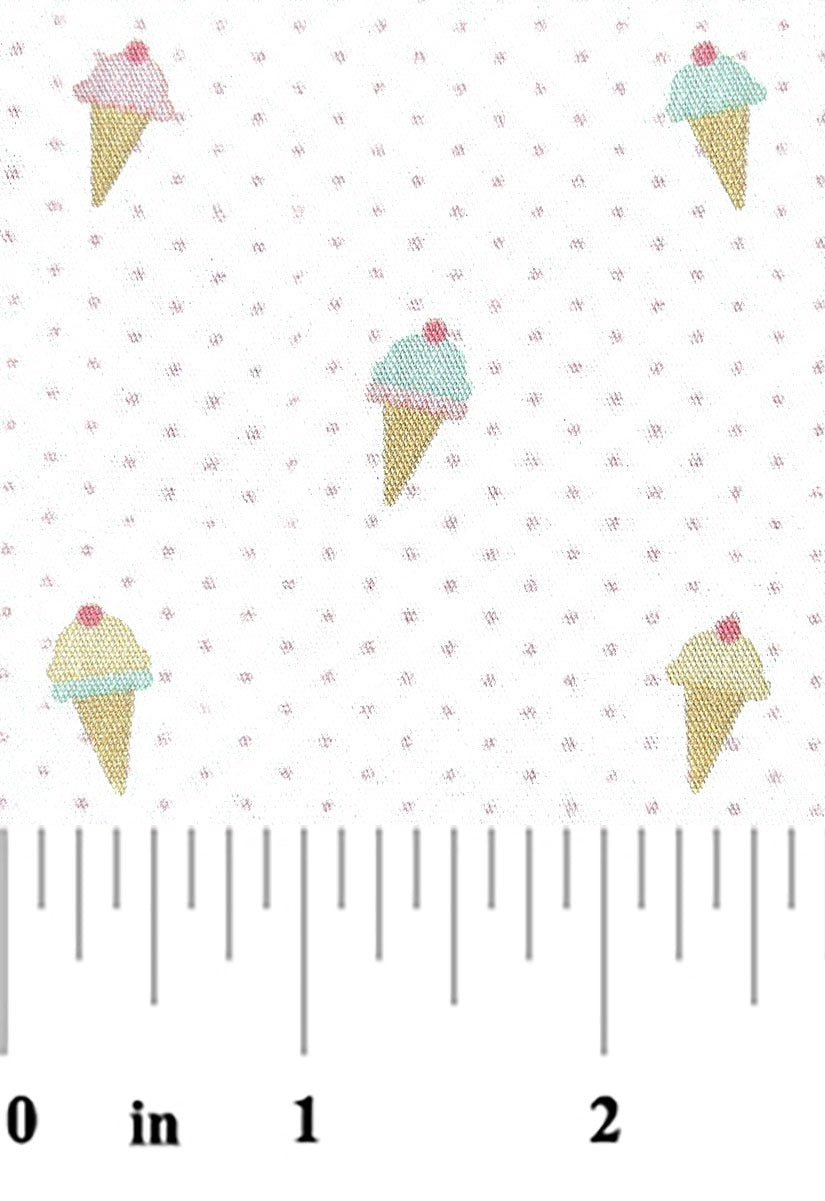 ice cream cones on a pink dot fabric with a ruler at bottom for scale