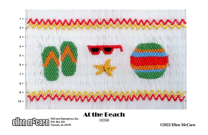 Embroidered design of beach-themed items including flip-flops, sunglasses, a star, and a ball on a white background.