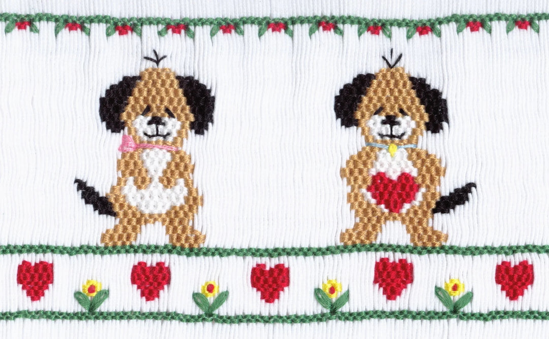 Smocking plate with two puppies and hearts. 10 rows of smocking on a y