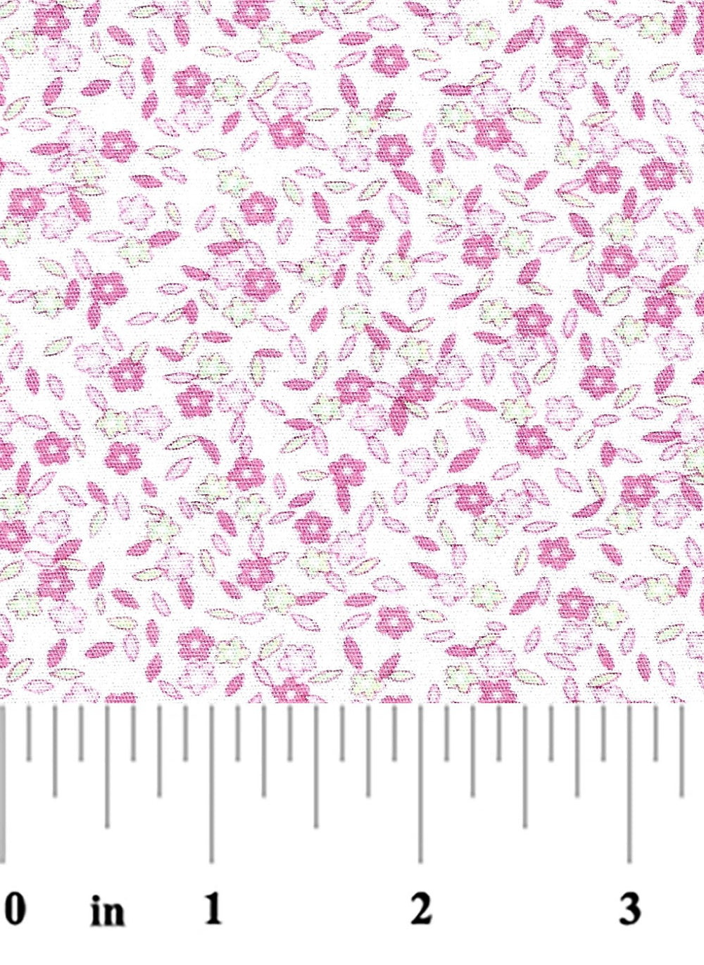 Floral patterned fabric with a ruler at the bottom for scale.