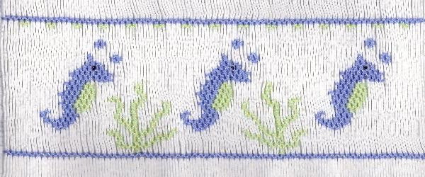 Smocking plate with three seahorses. 8 rows of smocking on a yoke.